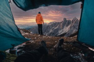 Campsite in the Dolomites, Italy – tent on alpine meadow, one of the most iconic European camping site