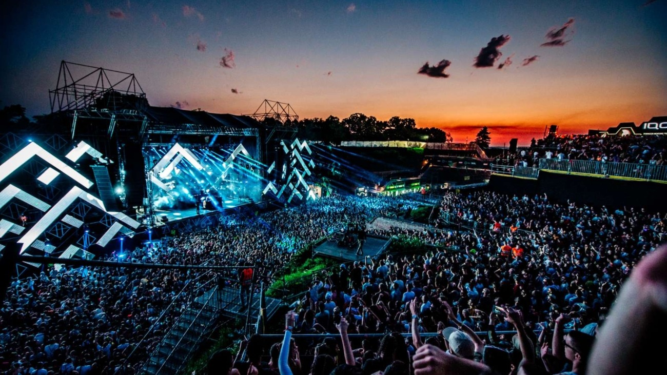 Crowd enjoying a concert at EXIT Festival in Novi Sad, Serbia during sunset- one of the best places to visit in Serbia.